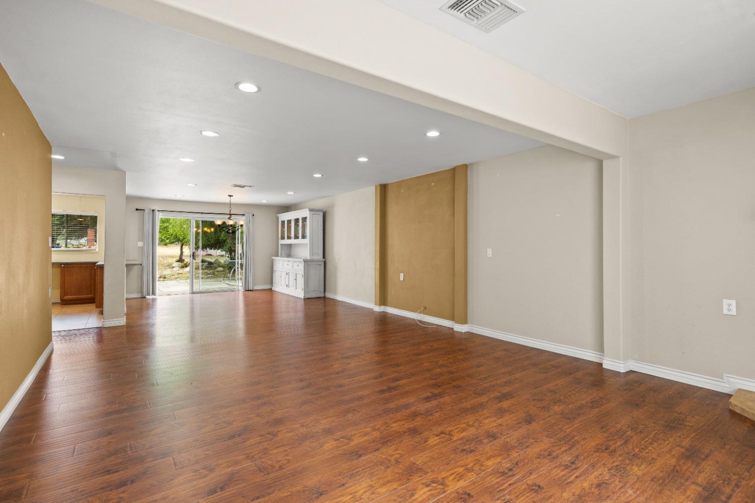 272 Rockaway Road Oak View, CA 93022 - Photo 21 of 33 a view of an empty room with wooden floor and a window