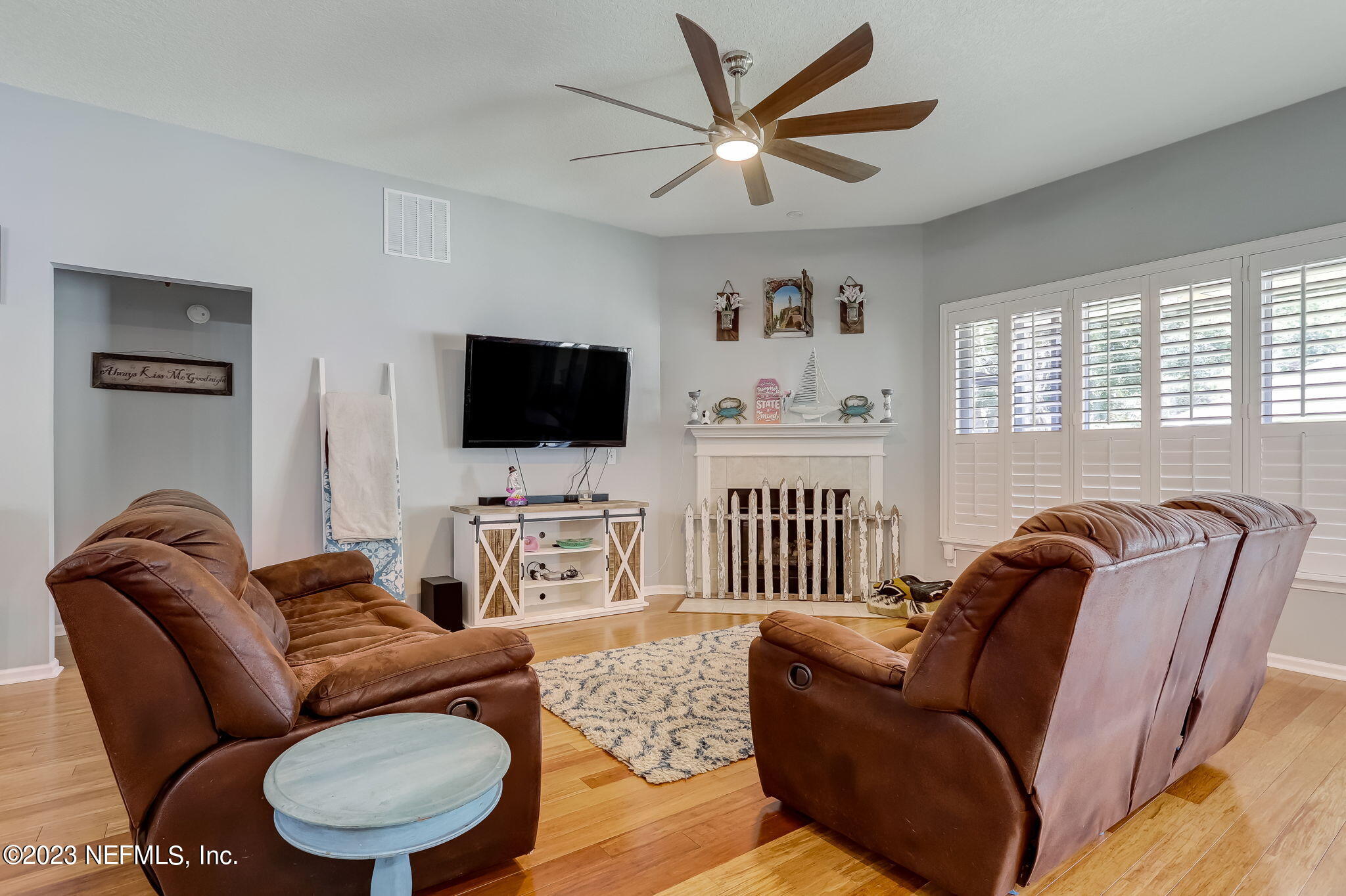 1564 Summerdown Way St. Johns, FL 32259 - Photo 12 of 83 a living room with furniture a flat screen tv and a large window