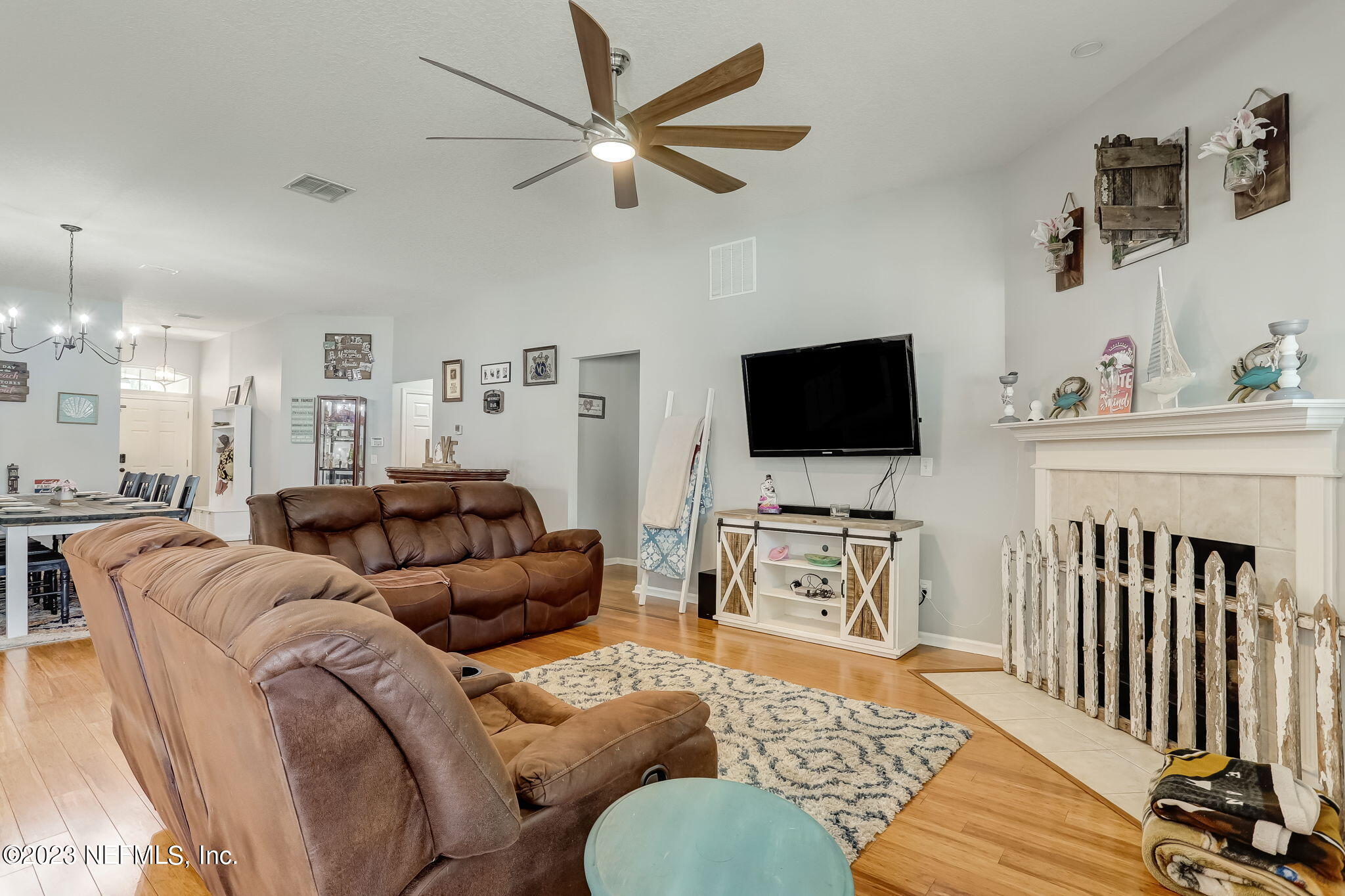 1564 Summerdown Way St. Johns, FL 32259 - Photo 13 of 83 a living room with furniture and a flat screen tv