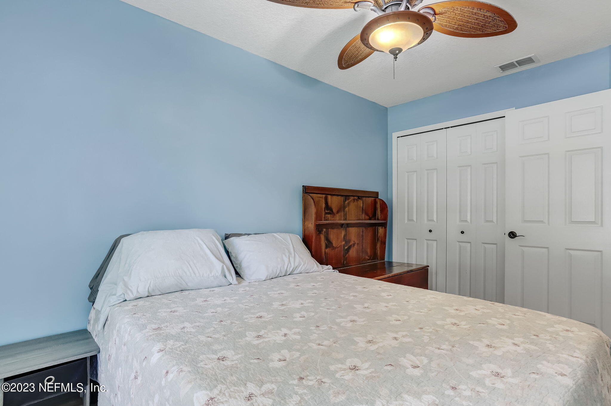 1564 Summerdown Way St. Johns, FL 32259 - Photo 32 of 83 a bedroom with a bed and painting on the wall