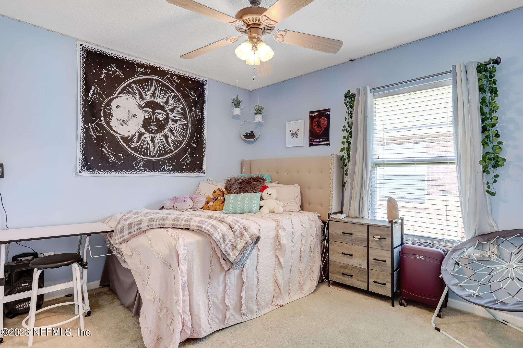 1564 Summerdown Way St. Johns, FL 32259 - Photo 36 of 83 a bedroom with a bed and a chandelier