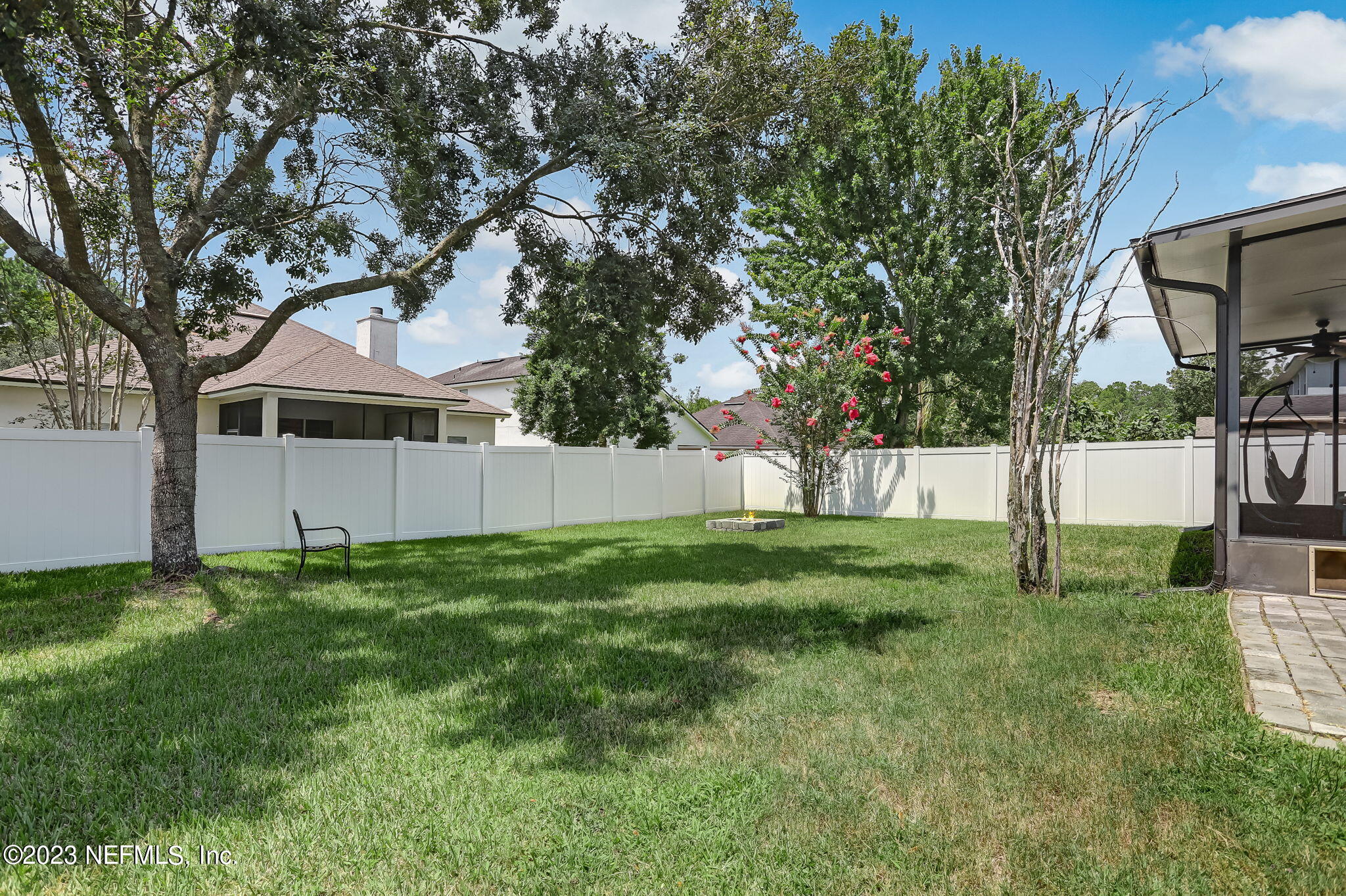 1564 Summerdown Way St. Johns, FL 32259 - Photo 46 of 83 a view of a yard with plants and a large tree