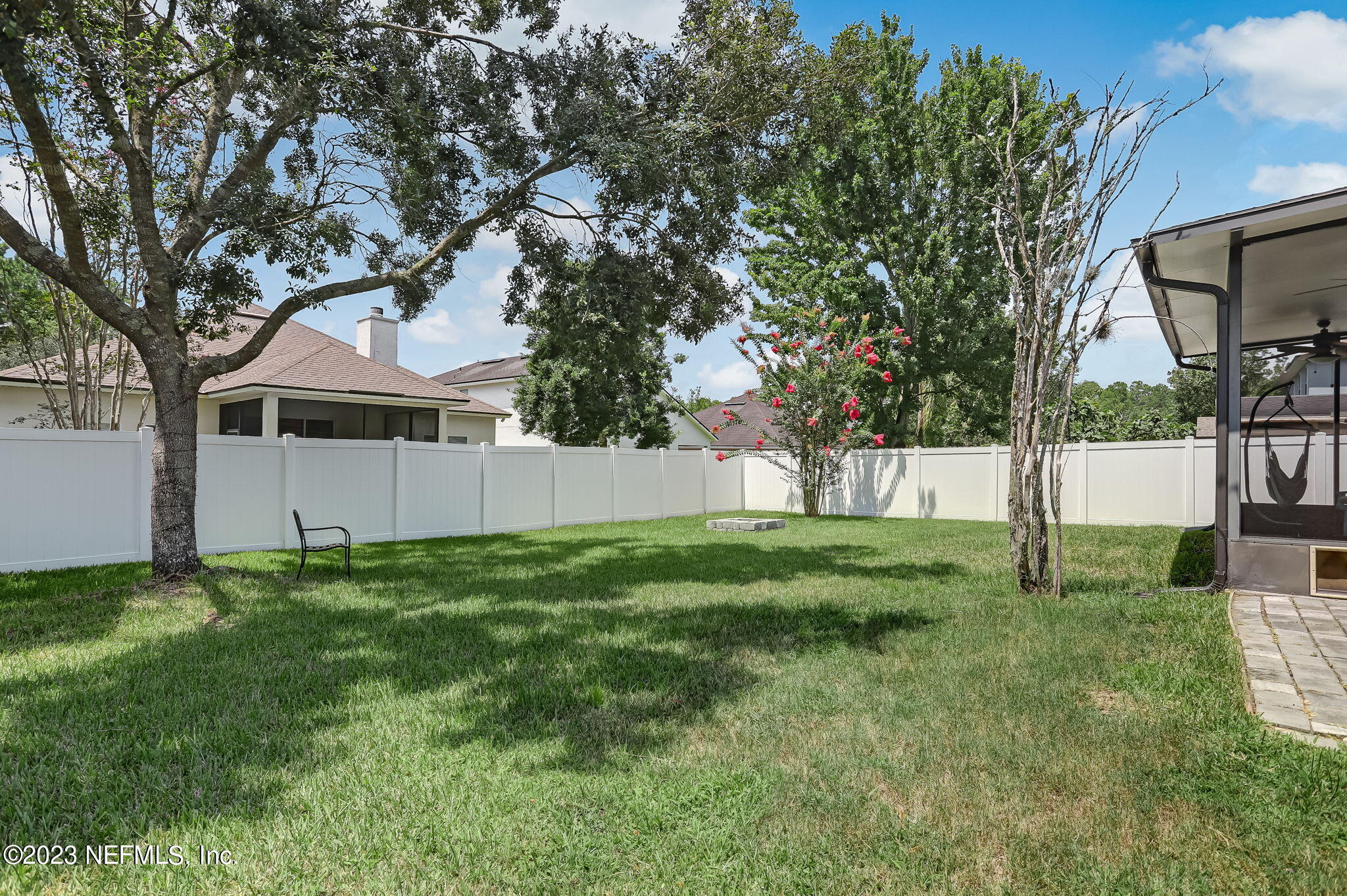 1564 Summerdown Way St. Johns, FL 32259 - Photo 47 of 83 a view of a yard with plants and a large tree