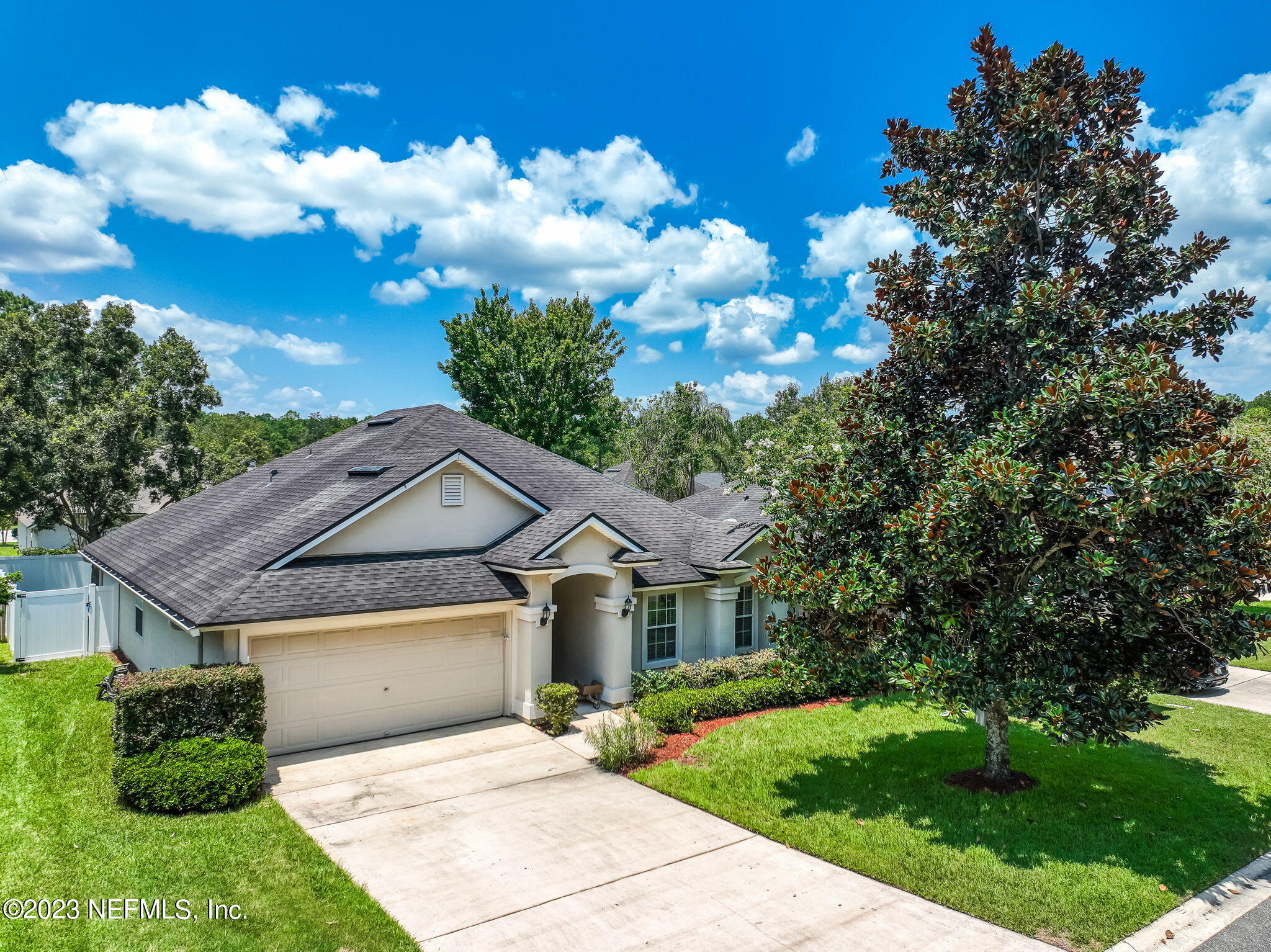 1564 Summerdown Way St. Johns, FL 32259 - Photo 54 of 83 a front view of a house with garden