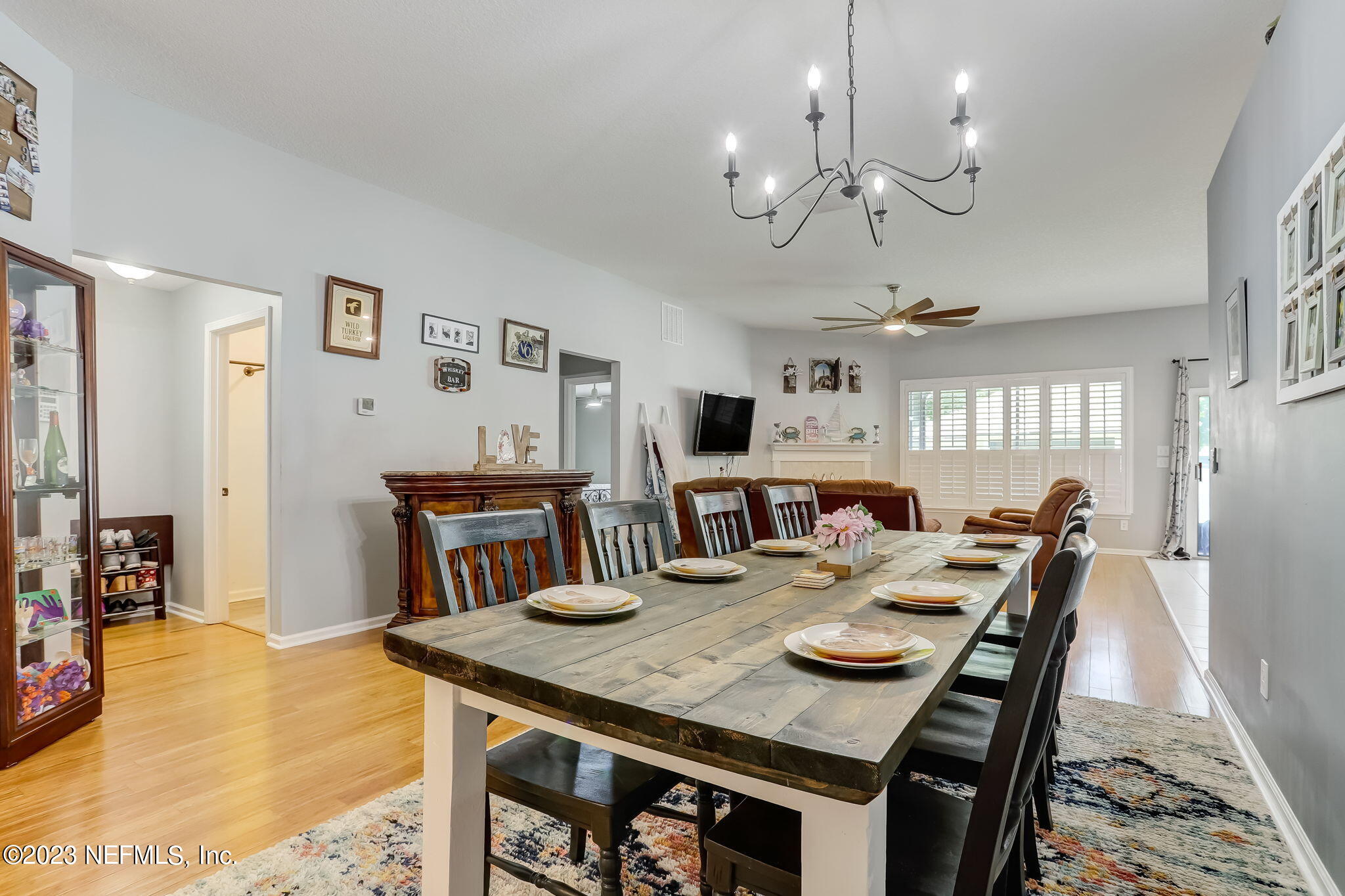 1564 Summerdown Way St. Johns, FL 32259 - Photo 8 of 83 a view of a dining room with furniture and a chandelier