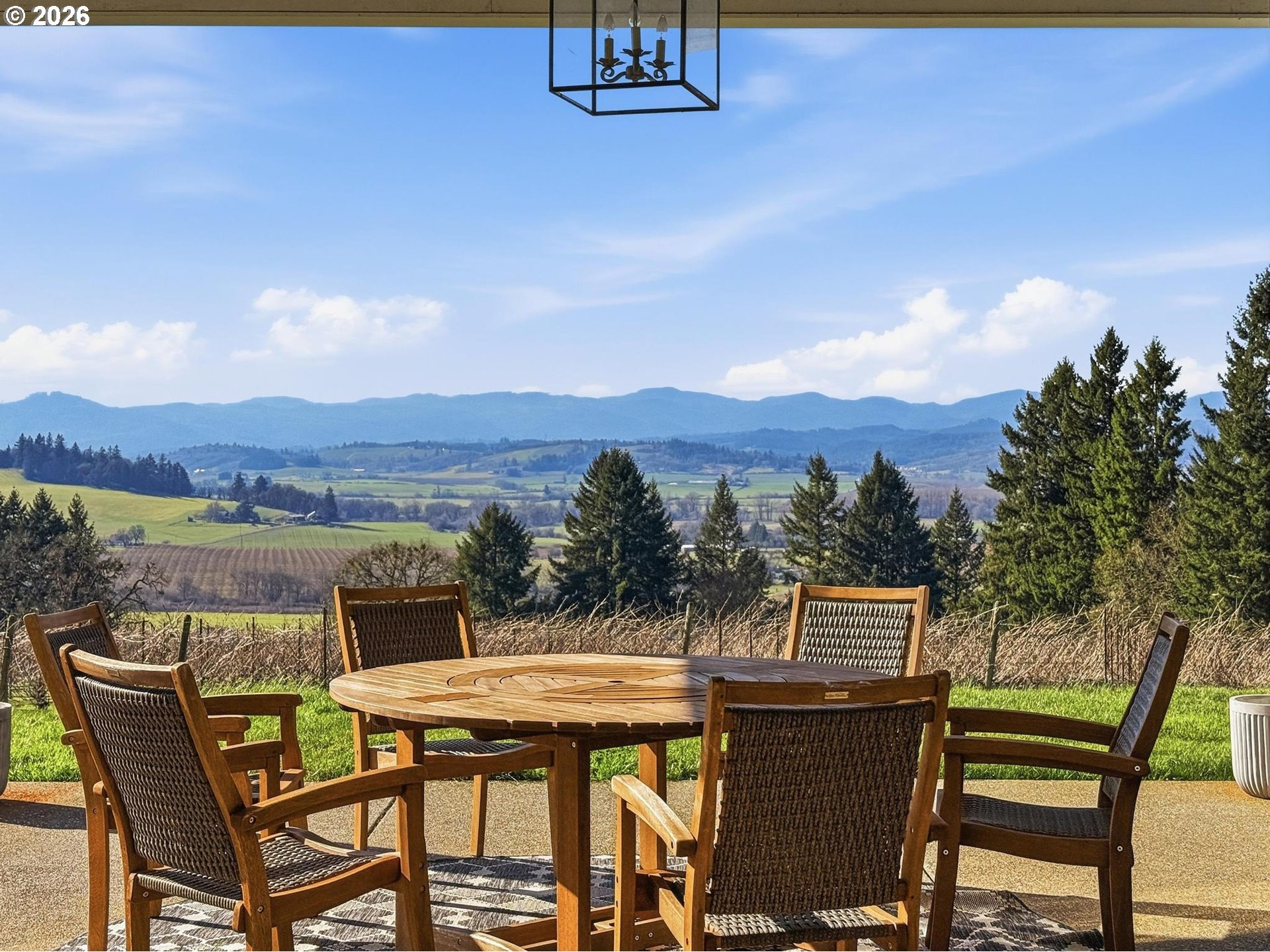 15682 Northeast Yamhill Road Yamhill, OR 97148 - Photo 22 of 47 a view of a chairs and table on the terrace
