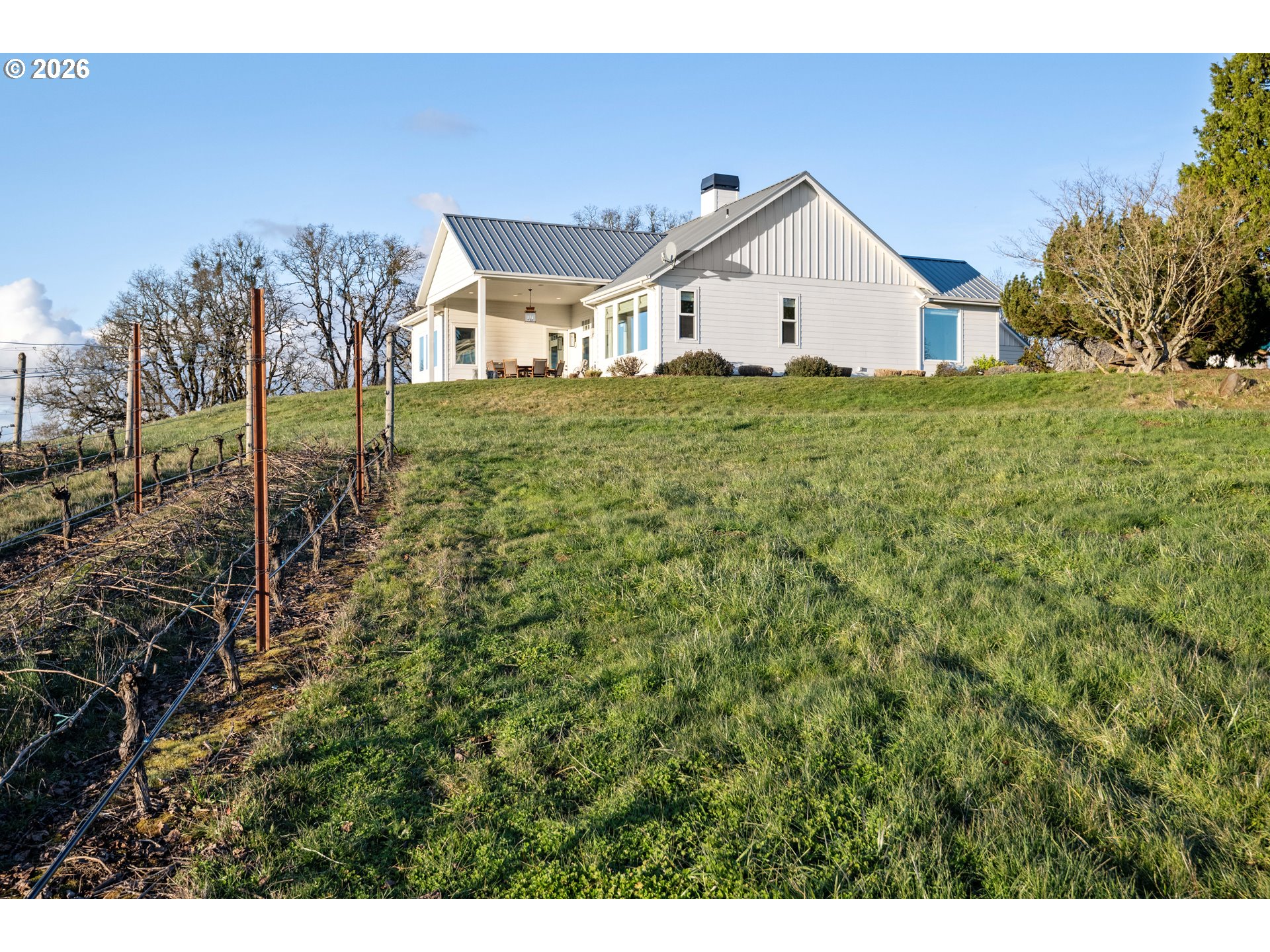 15682 Northeast Yamhill Road Yamhill, OR 97148 - Photo 25 of 47 a front view of a house with a yard