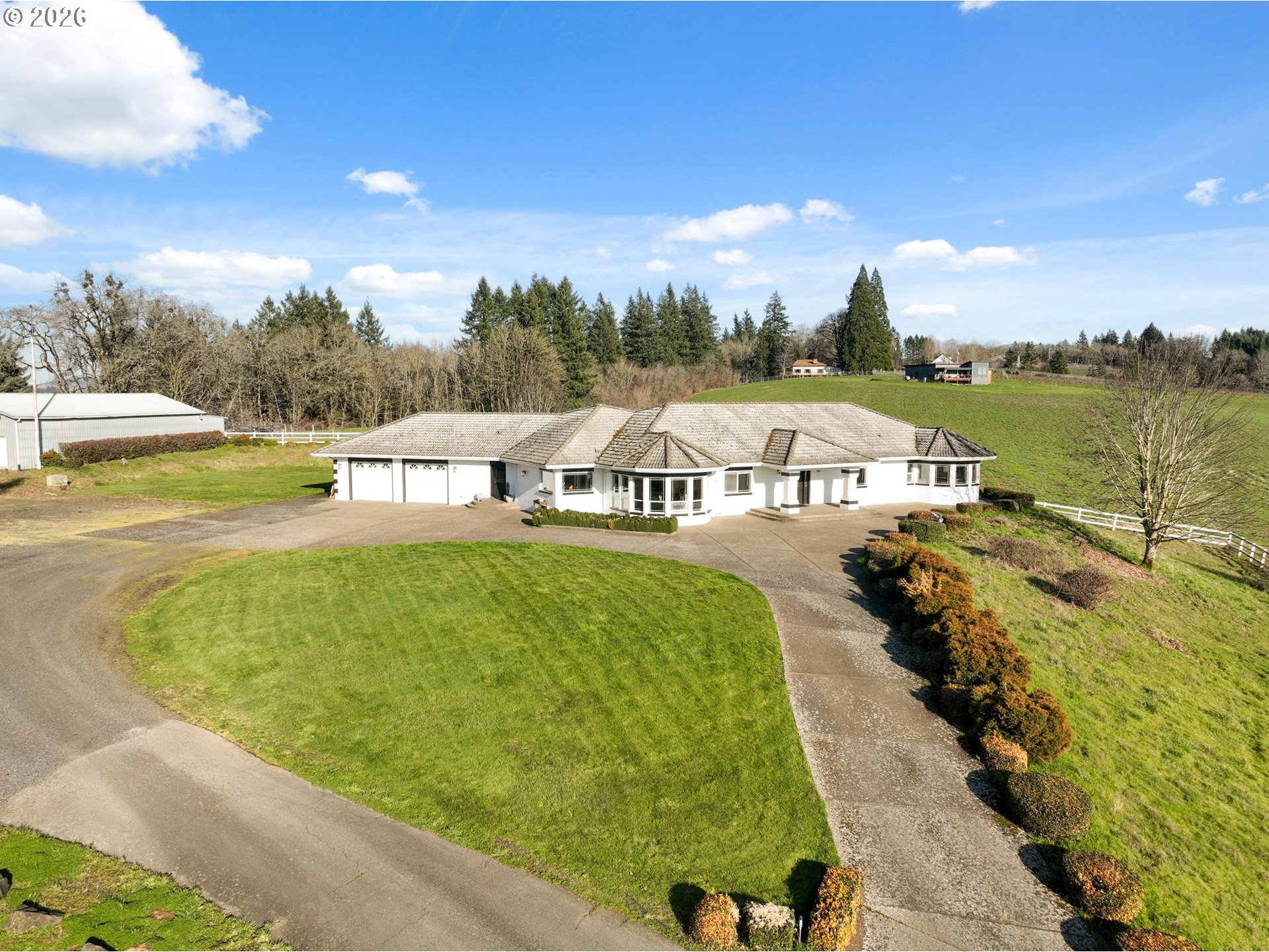 15682 Northeast Yamhill Road Yamhill, OR 97148 - Photo 28 of 47 a view of a lake with a house