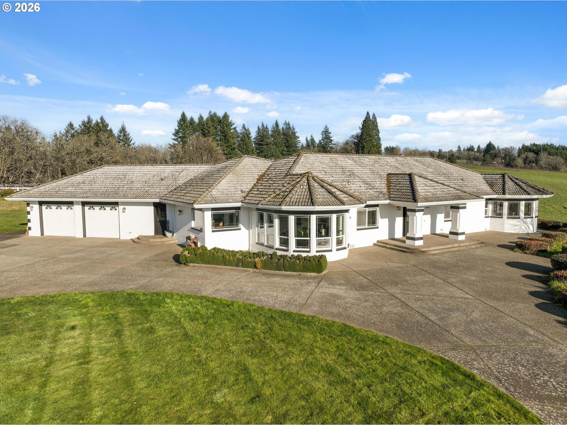 15682 Northeast Yamhill Road Yamhill, OR 97148 - Photo 29 of 47 a front view of a house with a garden and yard
