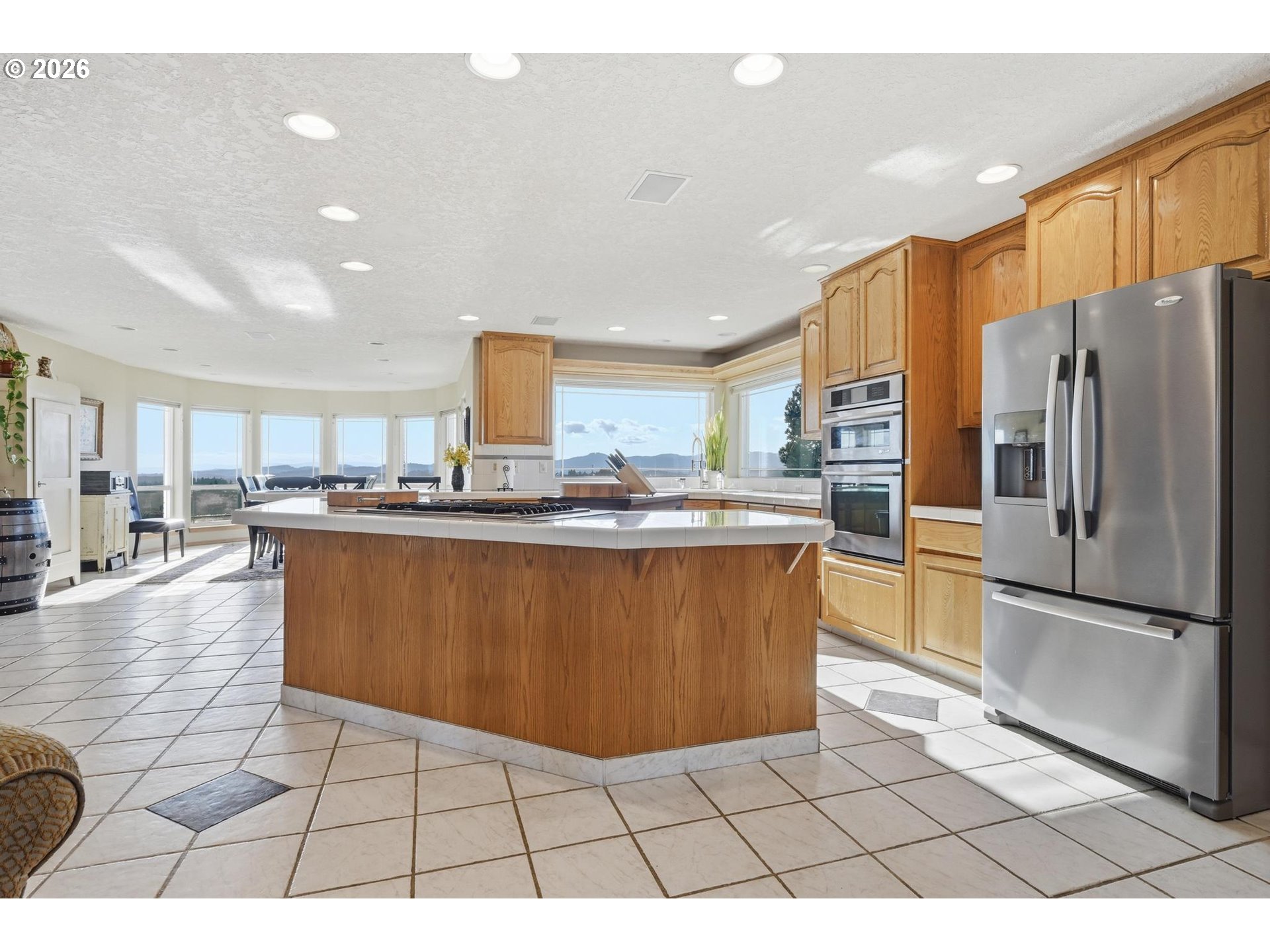 15682 Northeast Yamhill Road Yamhill, OR 97148 - Photo 31 of 47 a kitchen with stainless steel appliances granite countertop a refrigerator a sink a stove a microwave and cabinets