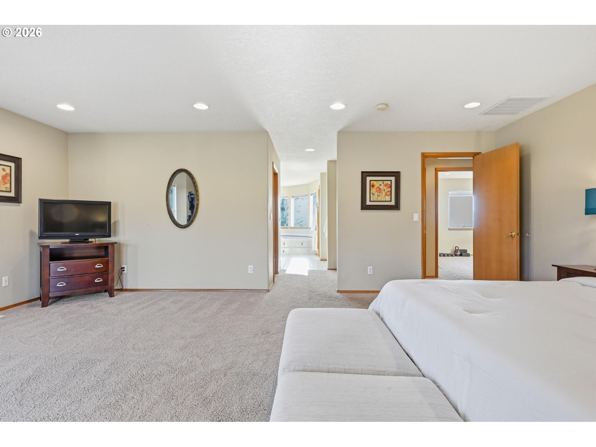 15682 Northeast Yamhill Road Yamhill, OR 97148 - Photo 33 of 47 a bedroom with a bed and a television