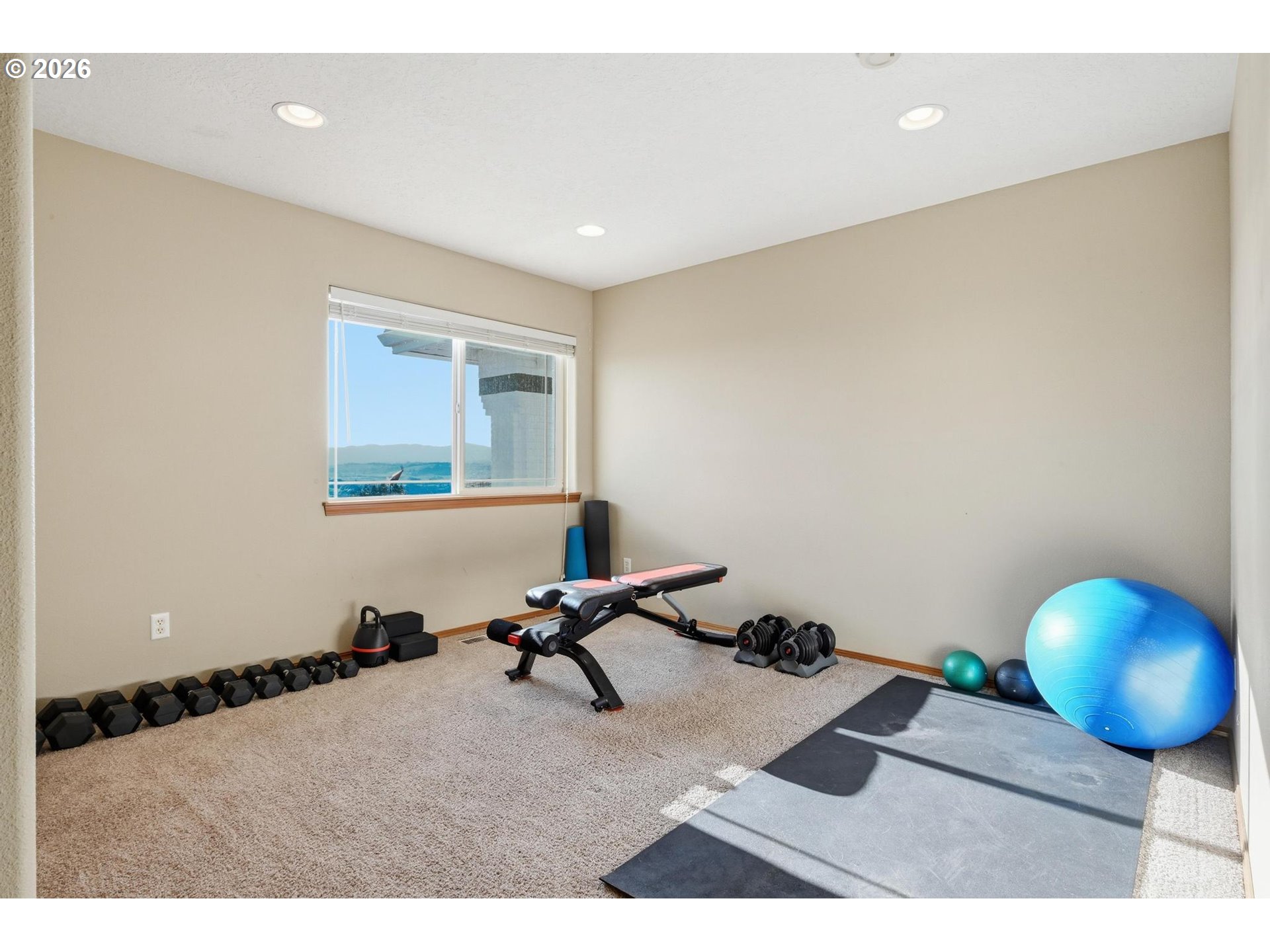 15682 Northeast Yamhill Road Yamhill, OR 97148 - Photo 36 of 47 a living room with a couch and gym equipment