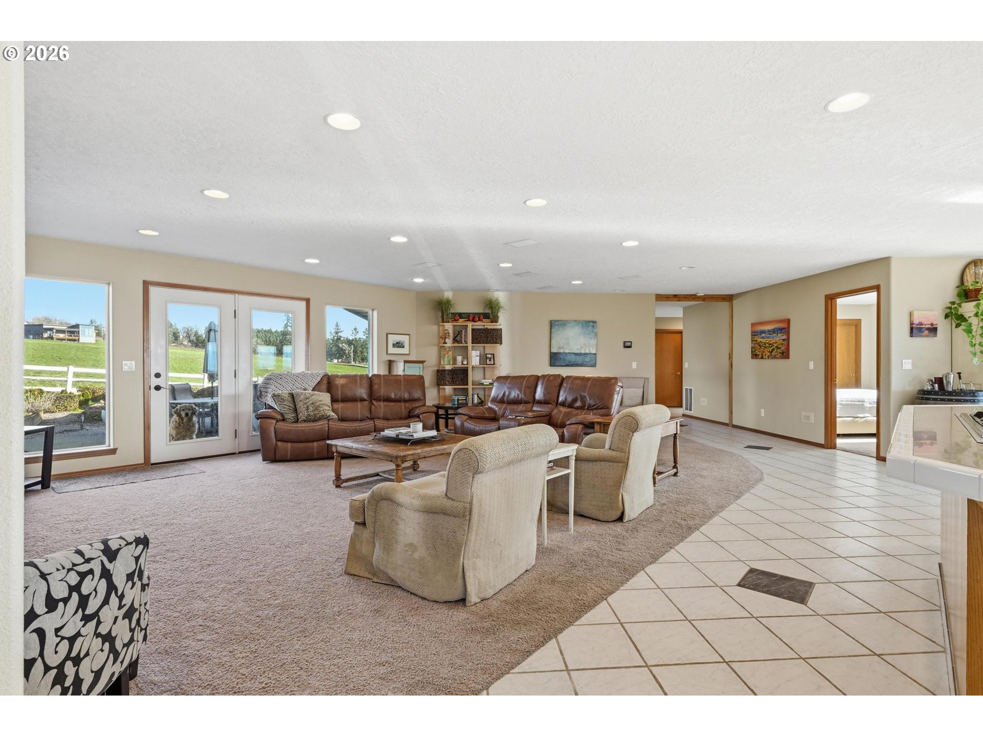 15682 Northeast Yamhill Road Yamhill, OR 97148 - Photo 38 of 47 a living room with furniture a flat screen tv and a table