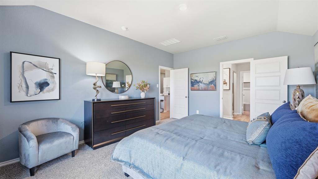 16500 Hudson Pr Way Justin, TX 76247 - Photo 17 of 38 a bedroom with a bed and a chair