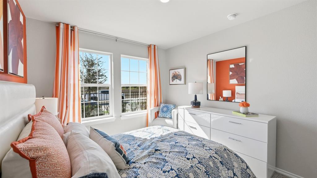 16500 Hudson Pr Way Justin, TX 76247 - Photo 29 of 38 a bedroom with a bed and a large window