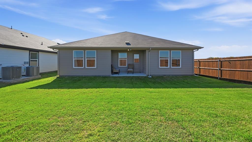 16500 Hudson Pr Way Justin, TX 76247 - Photo 37 of 38 a front view of a house with a yard