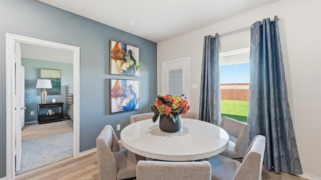 16500 Hudson Pr Way Justin, TX 76247 - Photo 8 of 38 a dining room with furniture and window