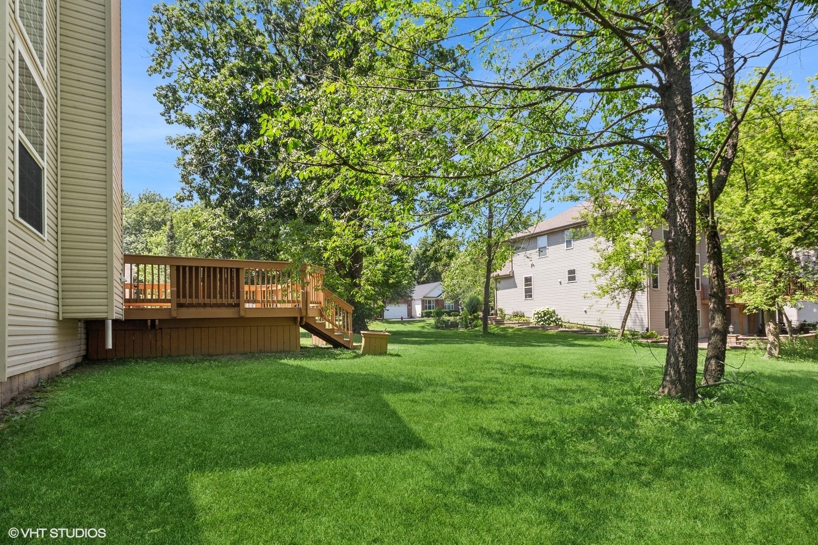 1489 Fox Path Lane Hoffman Estates, IL 60192 - Photo 27 of 27 a view of a backyard with large trees