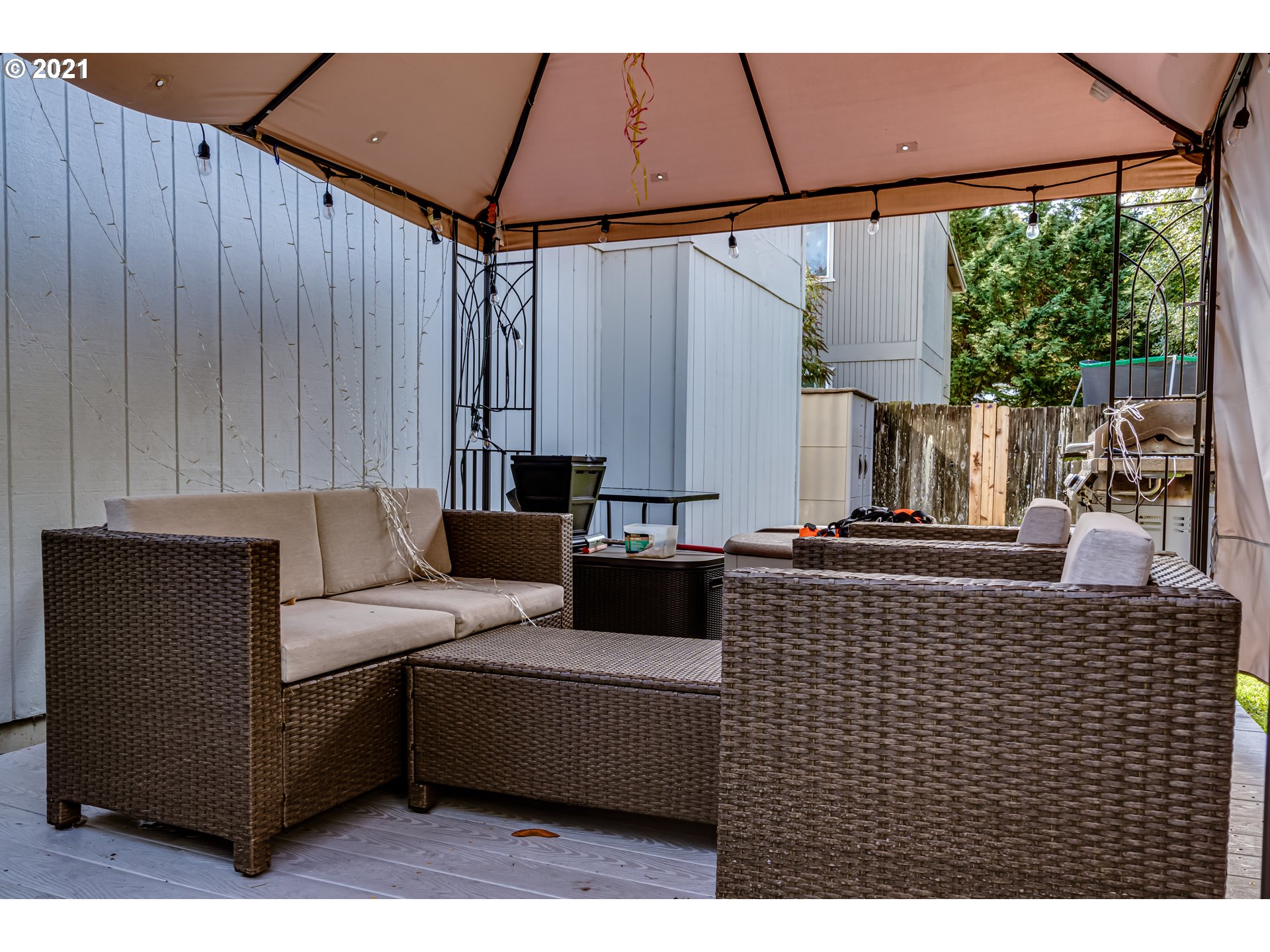 146 South 63rd Street Springfield, OR 97478 - Photo 22 of 27 a terrace of a house with outdoor seating