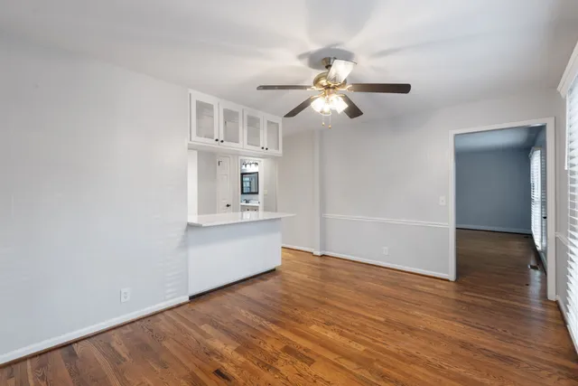 a kitchen with stainless steel appliances a refrigerator and a stove top oven