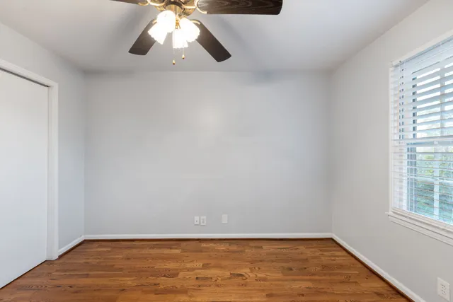 a bathroom with a sink vanity and a mirror