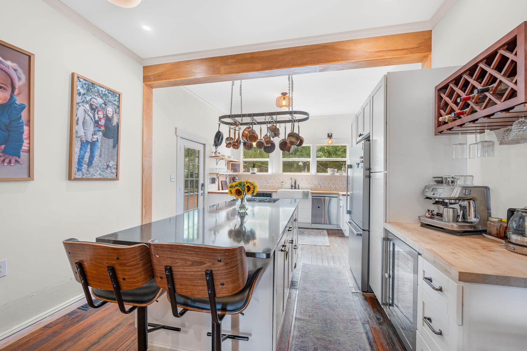 311 West 13th Street Columbia, TN 38401 - Photo 12 of 47 a view of a dining room with furniture and chandelier