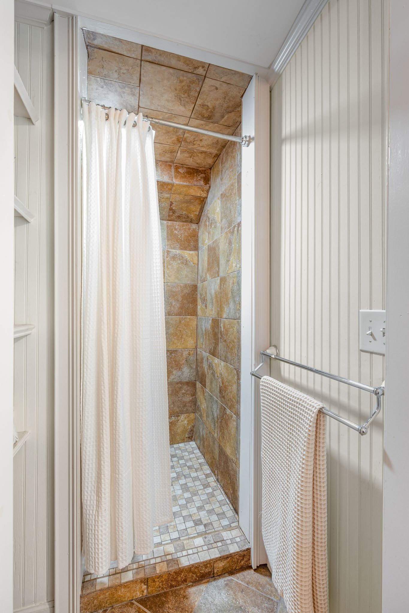 311 West 13th Street Columbia, TN 38401 - Photo 19 of 47 a view of a bathroom with a shower and a window