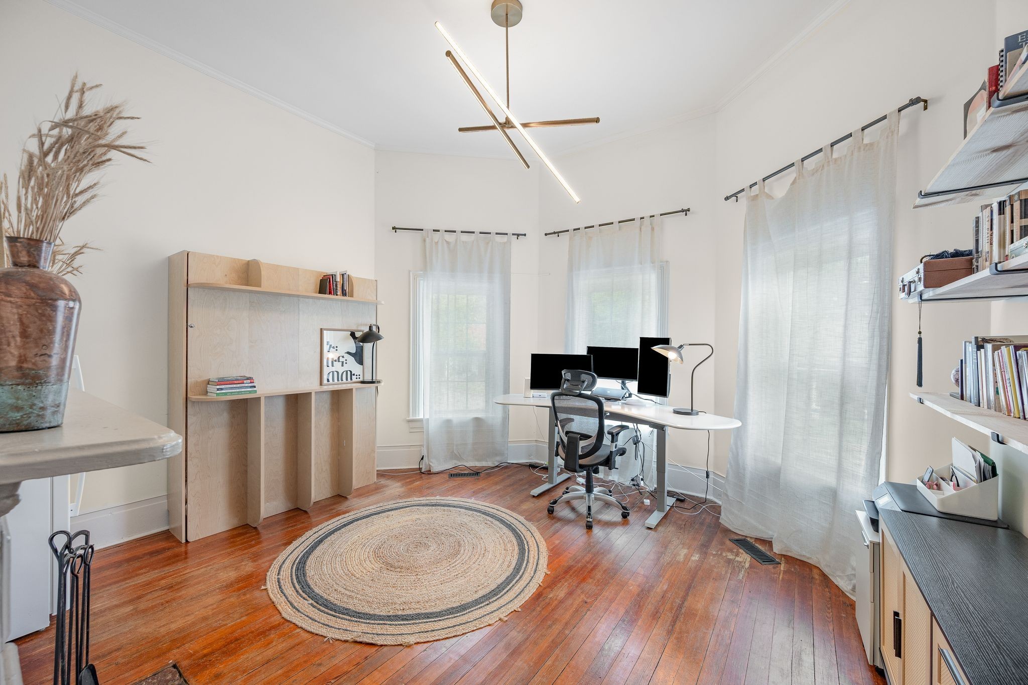 311 West 13th Street Columbia, TN 38401 - Photo 25 of 47 a living room with furniture and a wooden floor