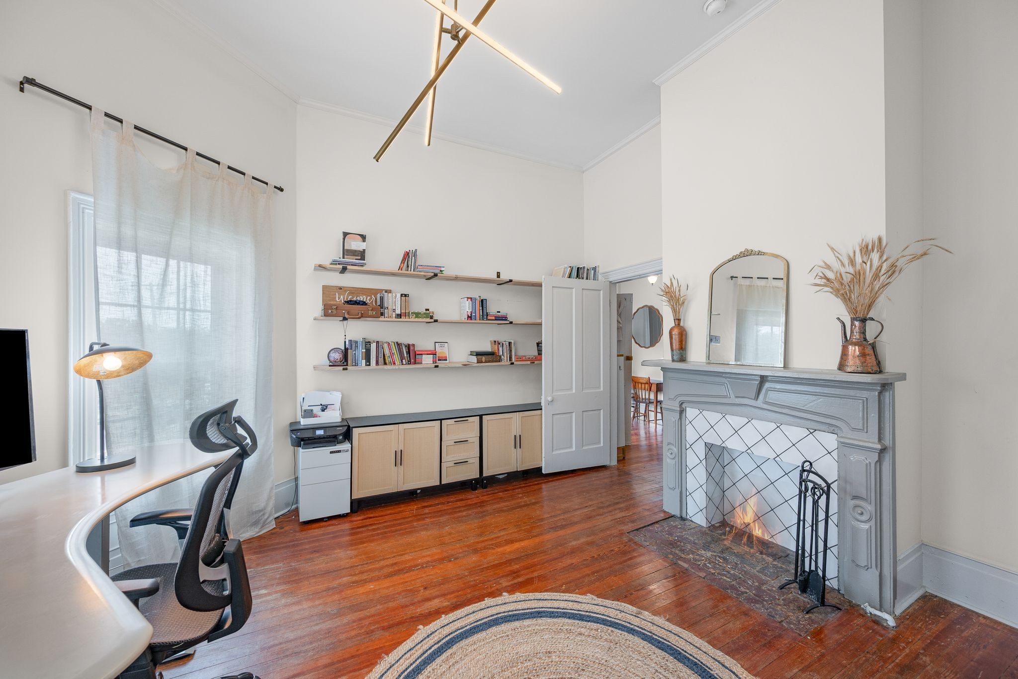 311 West 13th Street Columbia, TN 38401 - Photo 26 of 47 a view of a workspace with furniture and a fireplace