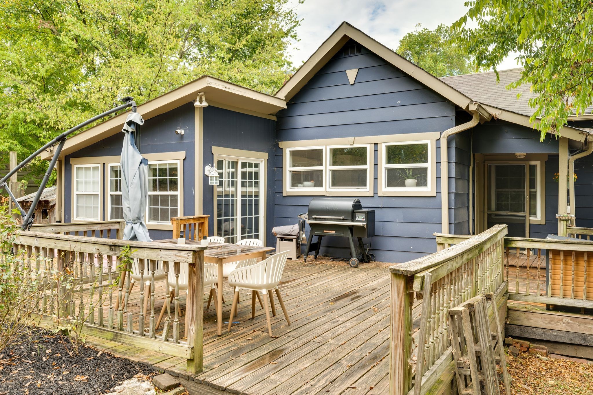 311 West 13th Street Columbia, TN 38401 - Photo 27 of 47 a view of a house with wooden deck and furniture