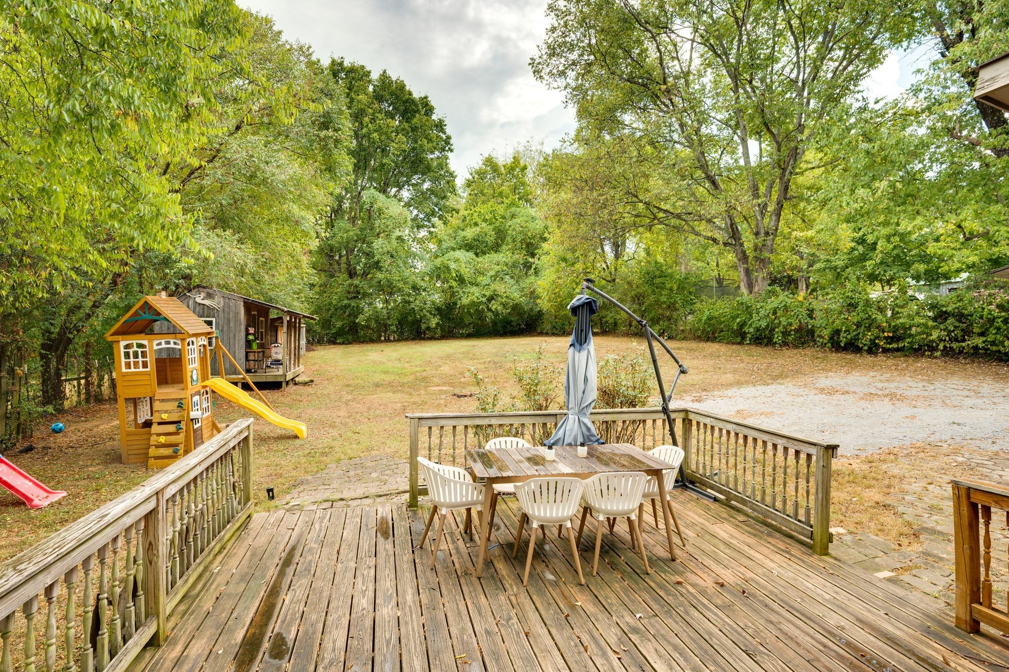 311 West 13th Street Columbia, TN 38401 - Photo 28 of 47 a view of a balcony with wooden floor and outdoor seating