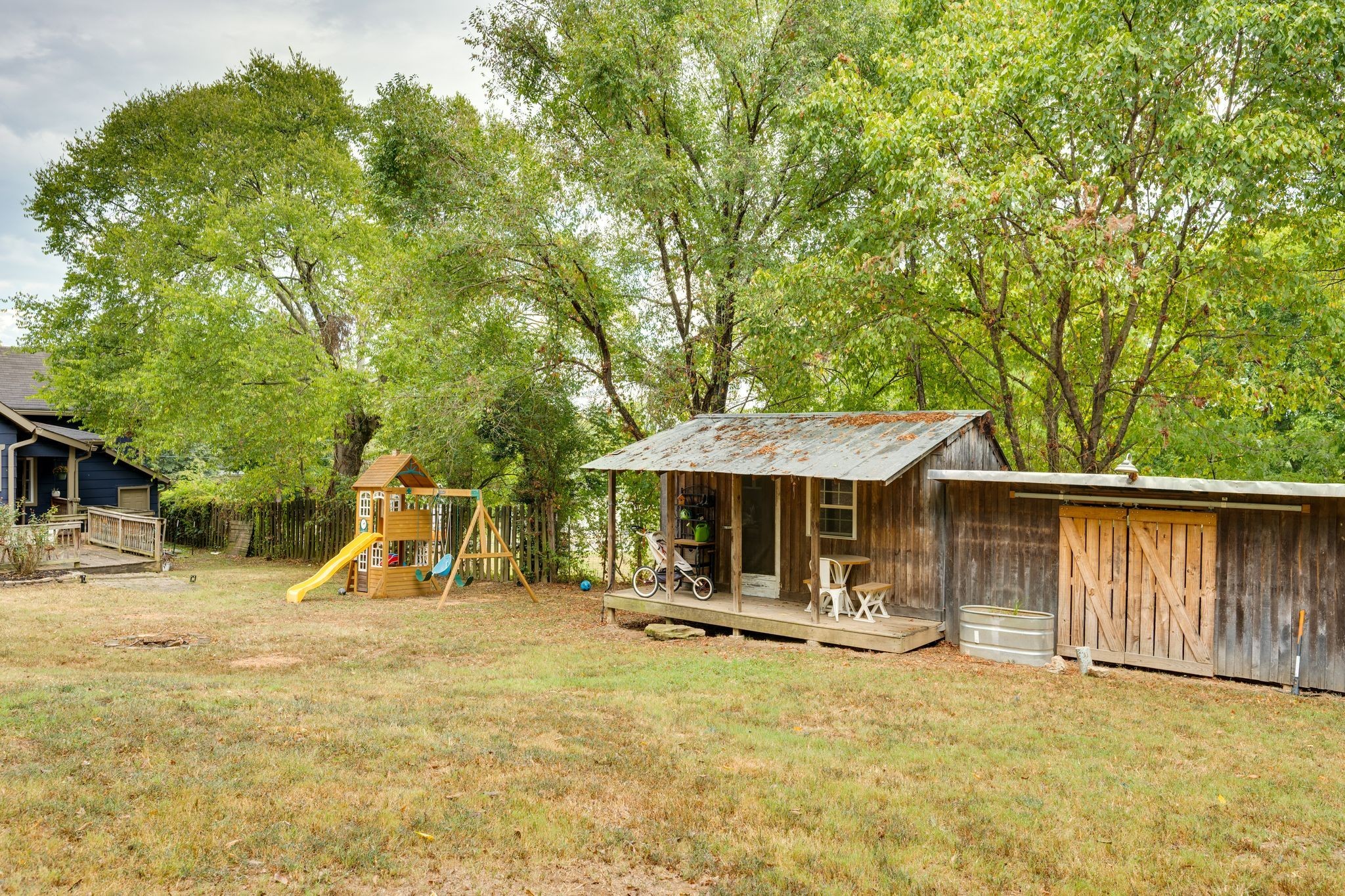 311 West 13th Street Columbia, TN 38401 - Photo 29 of 47 a view of a swimming pool with a patio and a yard