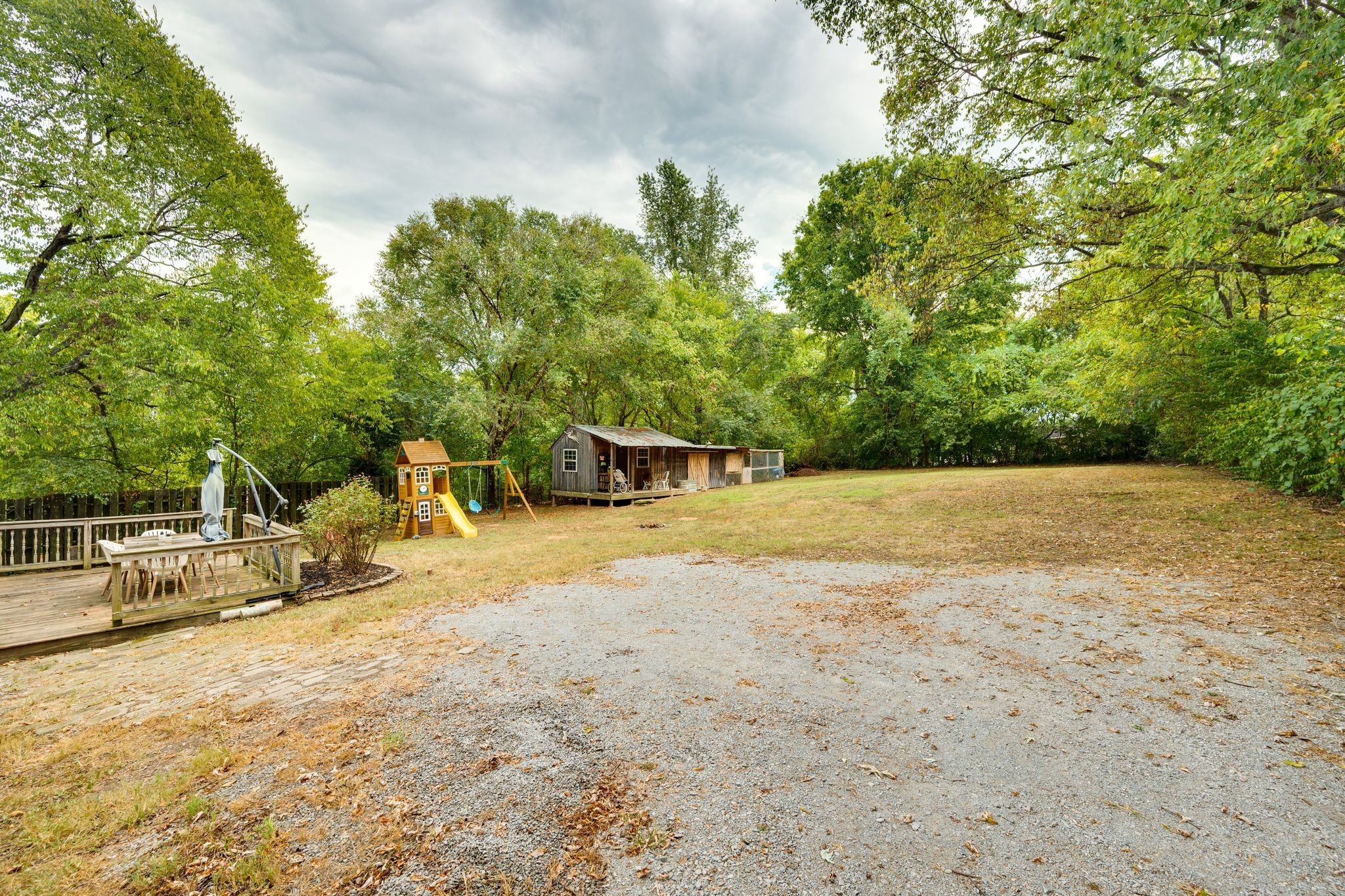 311 West 13th Street Columbia, TN 38401 - Photo 30 of 47 a view of backyard with swimming pool and seating space