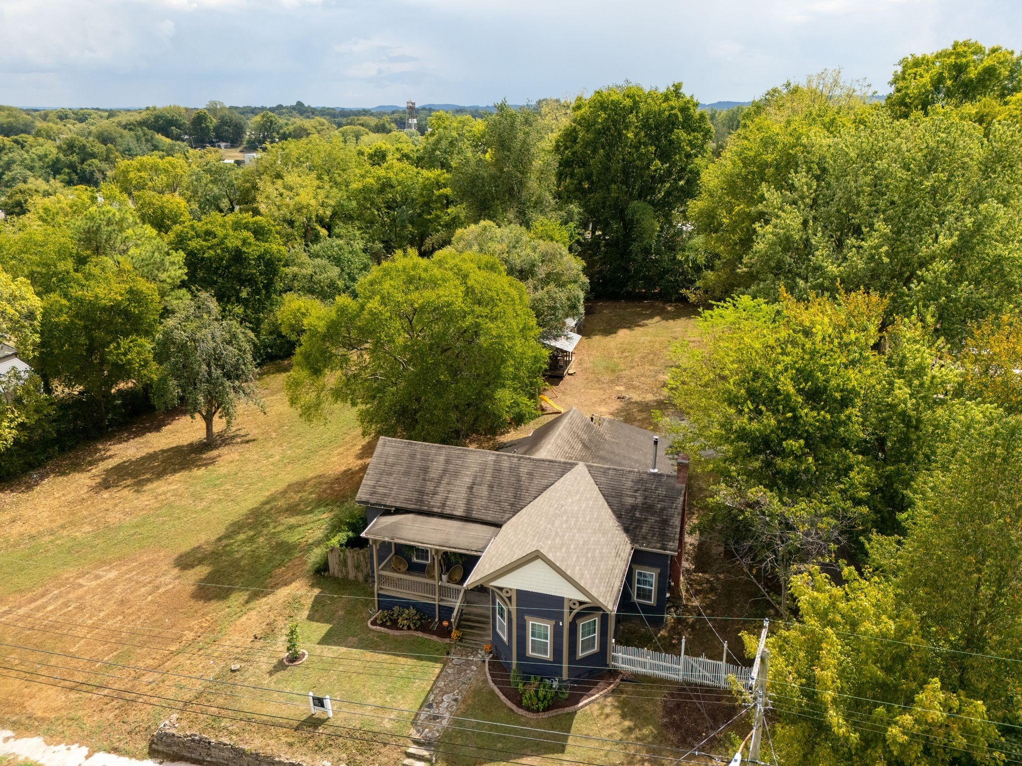 311 West 13th Street Columbia, TN 38401 - Photo 33 of 47 a view of a house with a yard and mountain