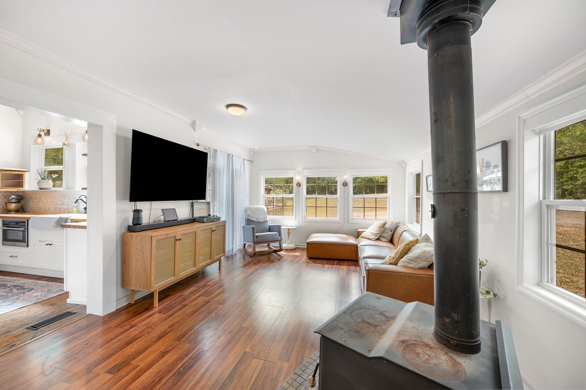 311 West 13th Street Columbia, TN 38401 - Photo 9 of 47 a living room with furniture and a flat screen tv
