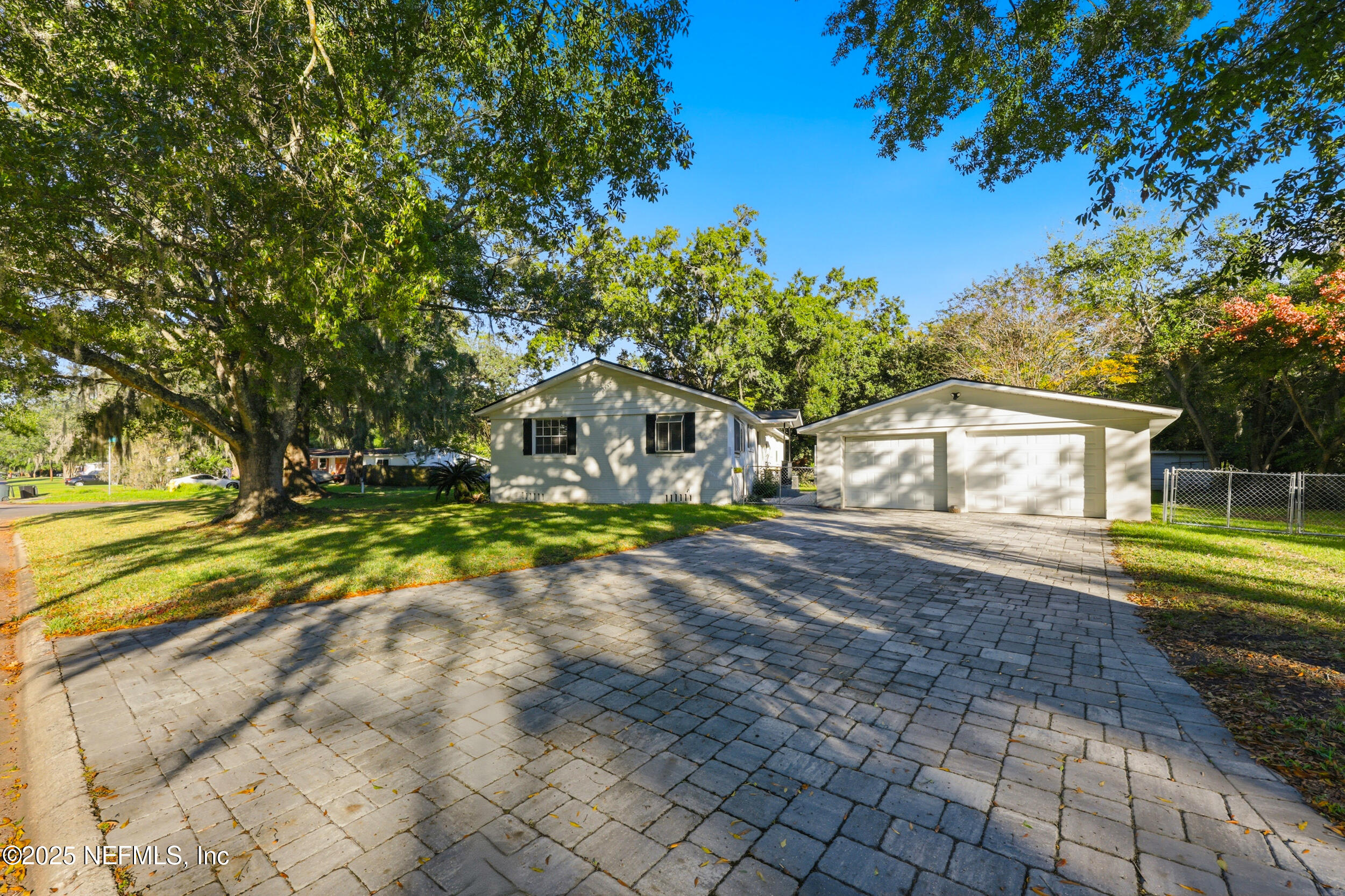 5201 Royce Avenue Jacksonville, FL 32205 - Photo 34 of 34 a view of a house with a yard and sitting area