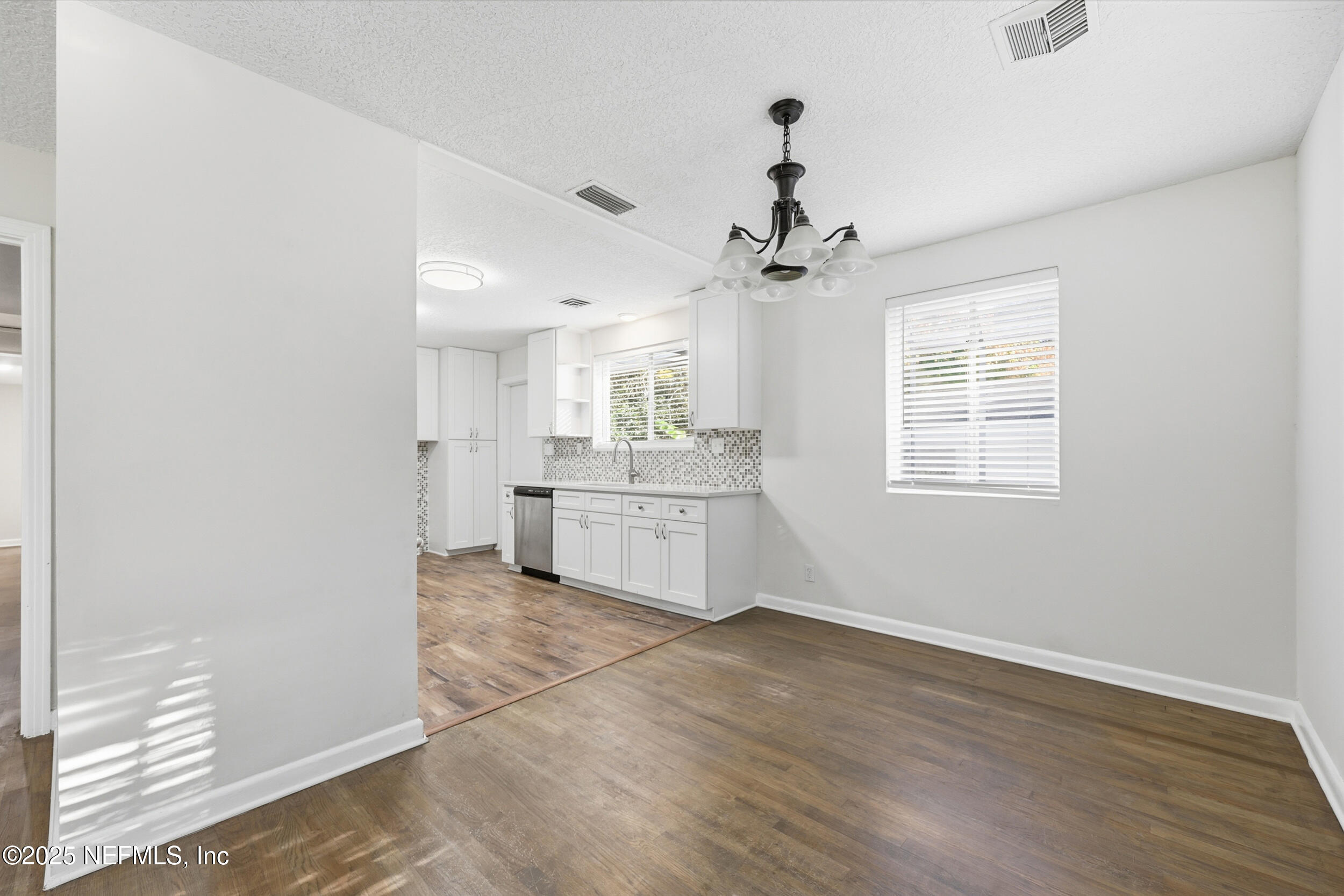 5201 Royce Avenue Jacksonville, FL 32205 - Photo 9 of 34 a view of a kitchen with a sink and cabinet area