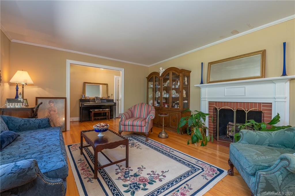 190 South Ridgecrest Street Rutherfordton, NC 28139 - Photo 12 of 26 a living room with furniture and a fireplace