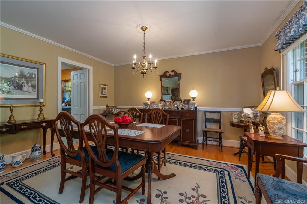 190 South Ridgecrest Street Rutherfordton, NC 28139 - Photo 13 of 26 a view of a dining room with furniture and chandelier