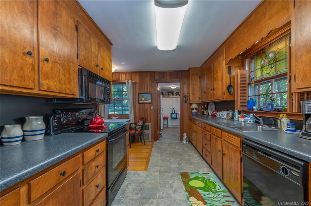 190 South Ridgecrest Street Rutherfordton, NC 28139 - Photo 14 of 26 a kitchen with lots of counter space and a window