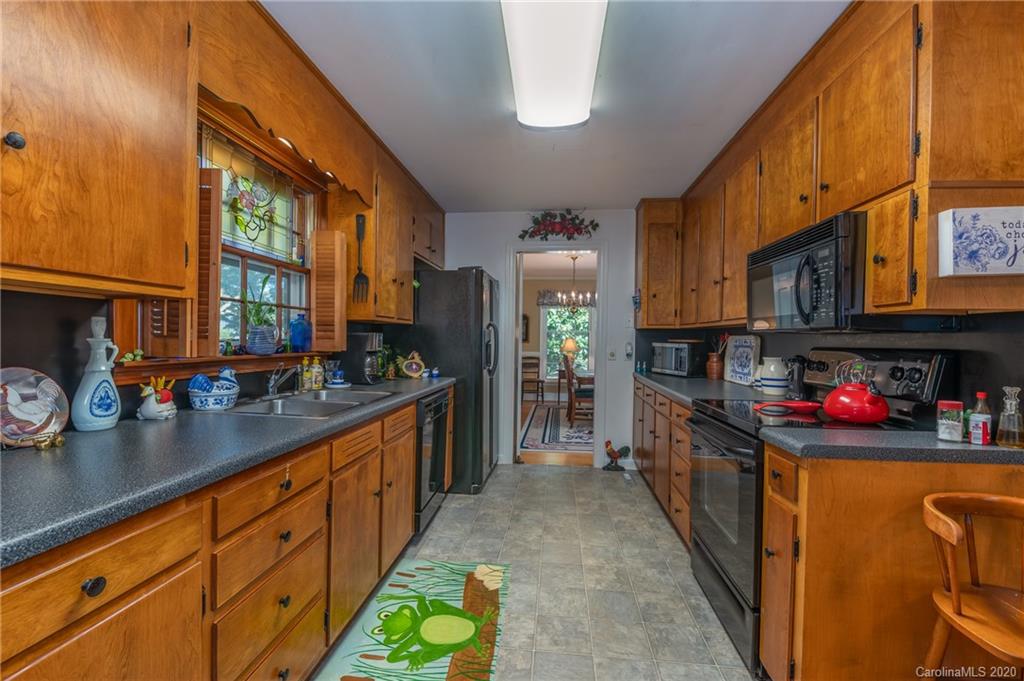 190 South Ridgecrest Street Rutherfordton, NC 28139 - Photo 17 of 26 a kitchen with stainless steel appliances granite countertop a sink and cabinets
