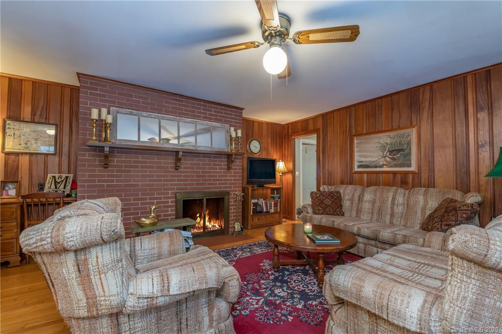 190 South Ridgecrest Street Rutherfordton, NC 28139 - Photo 18 of 26 a living room with furniture and a fireplace