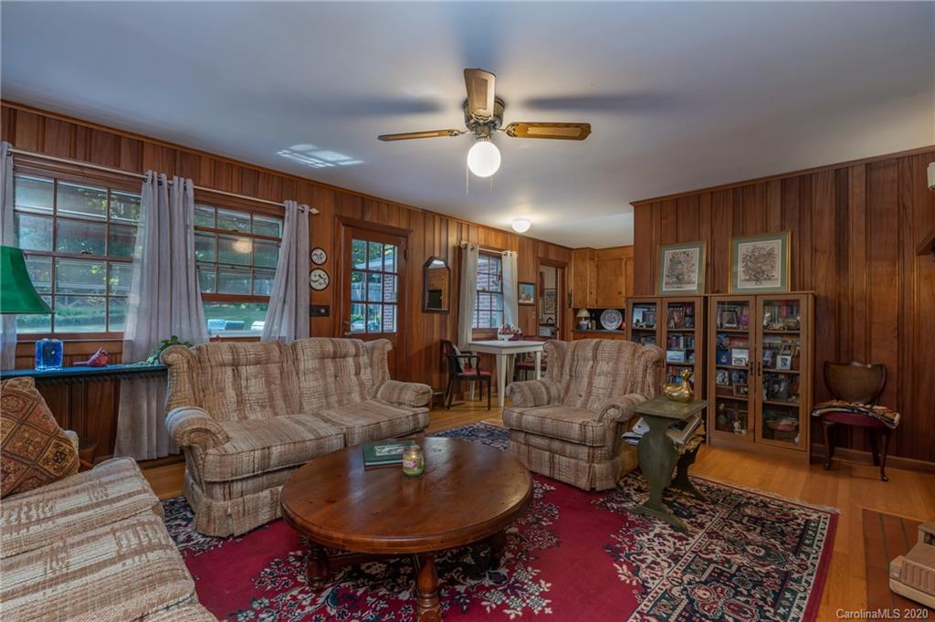 190 South Ridgecrest Street Rutherfordton, NC 28139 - Photo 19 of 26 a living room with furniture and a chandelier