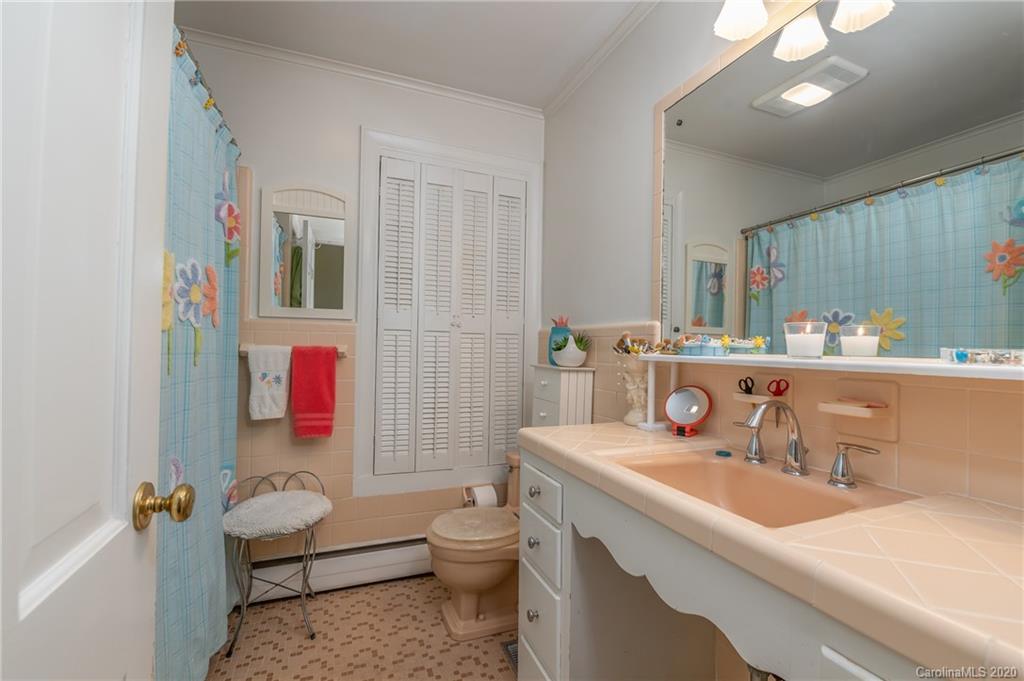 190 South Ridgecrest Street Rutherfordton, NC 28139 - Photo 25 of 26 a bathroom with a sink vanity mirror and toilet