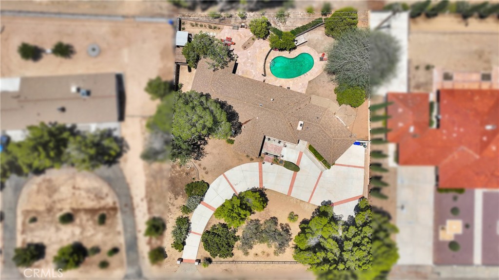 19955 Chickasaw Road Apple Valley, CA 92307 - Photo 53 of 60 an aerial view of a house with a lot of flower plants