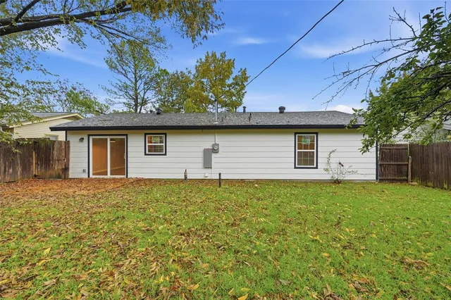 a house view with a garden space