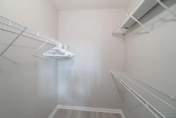 a view of a room with racks on the wall