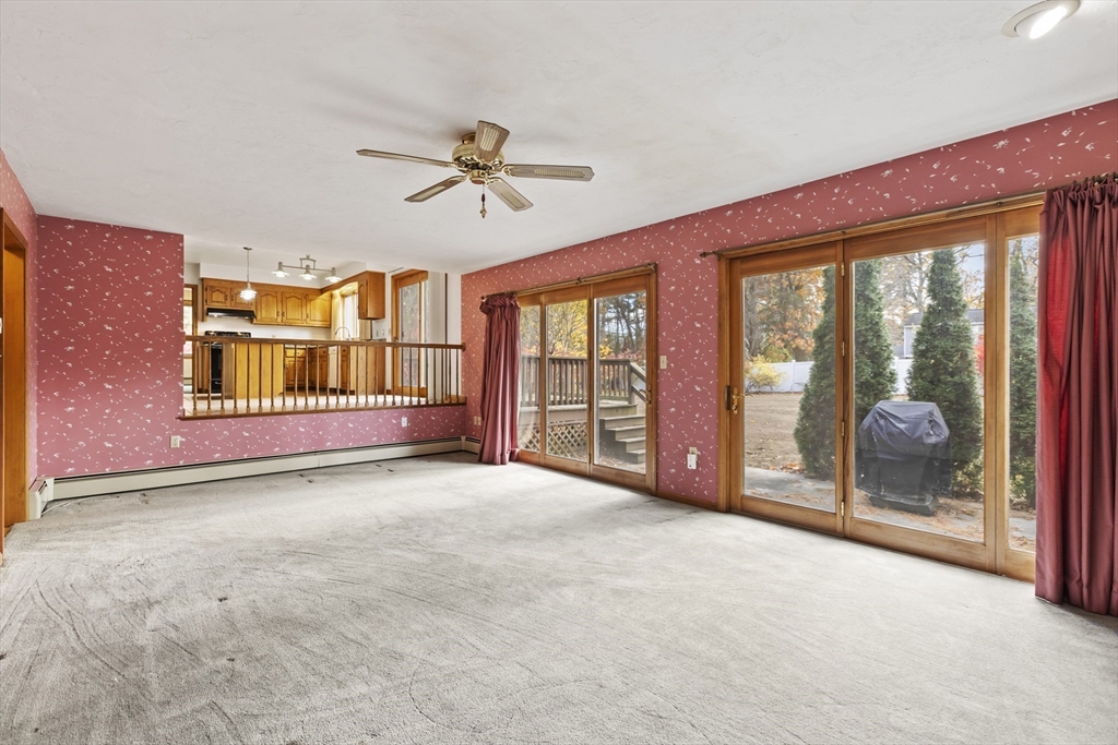 43 Maple Road Westford, MA 01886 - Photo 15 of 31 a view of an empty room with glass door