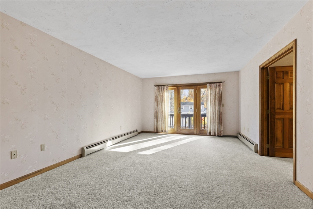 43 Maple Road Westford, MA 01886 - Photo 19 of 31 a view of an empty room with window