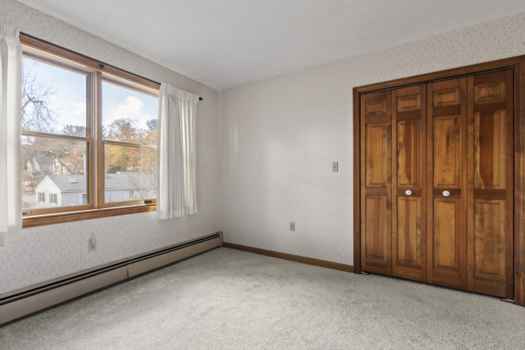 43 Maple Road Westford, MA 01886 - Photo 20 of 31 an empty room with windows